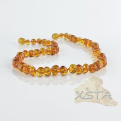 Amber necklace polished cognac baroque